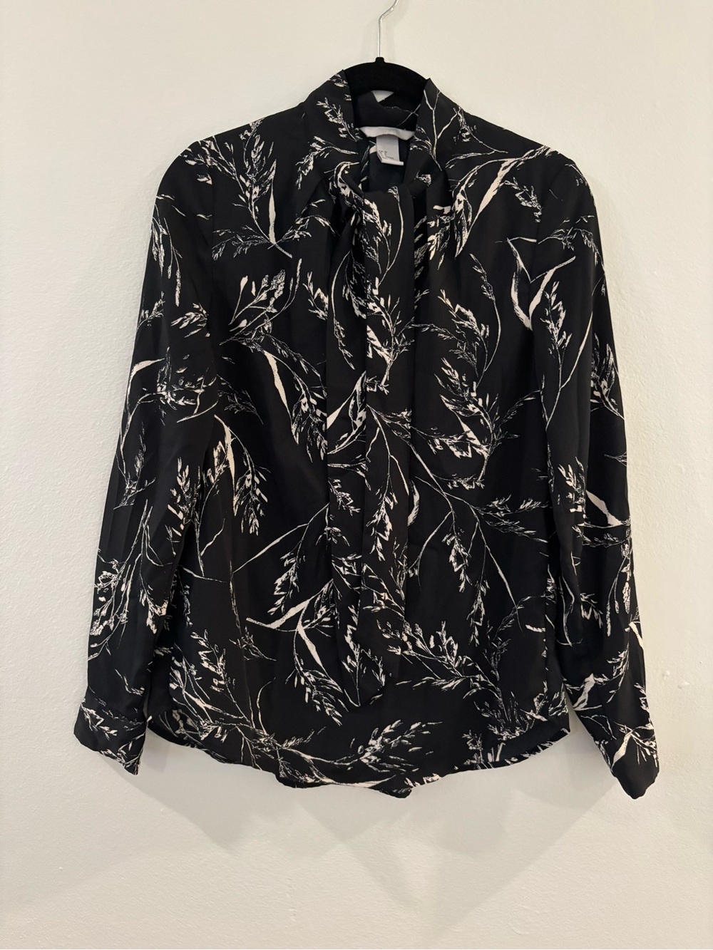 H&M Black Blouse with White Botanical Print and Tie Neck